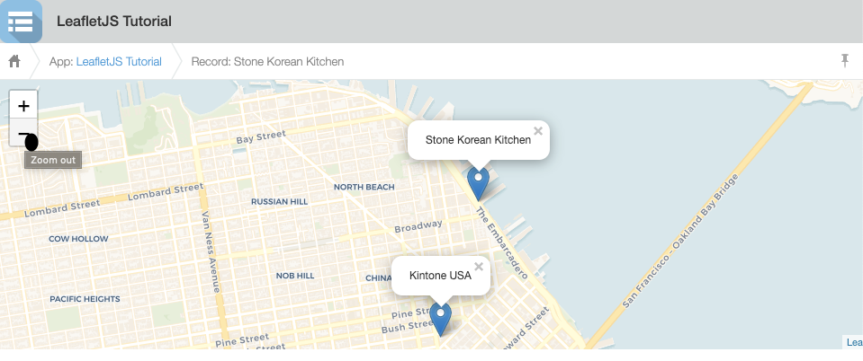 A screenshot of the Record Details page displaying a map, with pins for a Korean diner and Kintone USA.